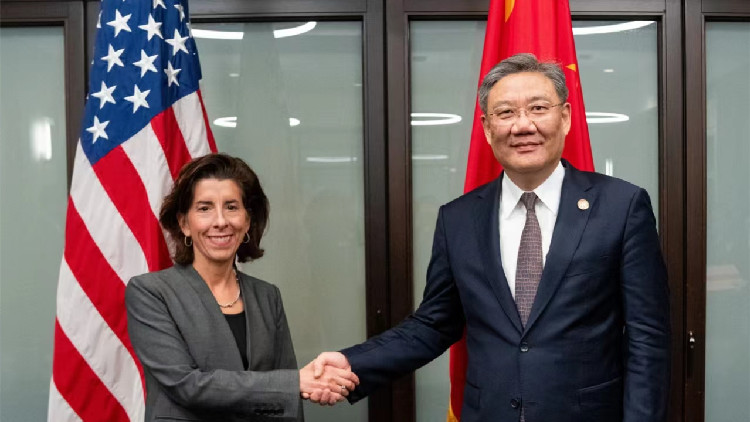 王文濤與美國商務(wù)部長雷蒙多舉行會談