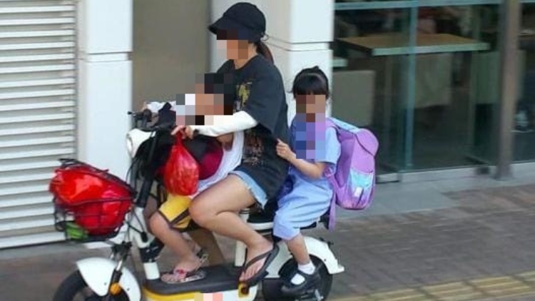女子上水駕電動(dòng)單車載兩小童 涉無牌駕駛被捕