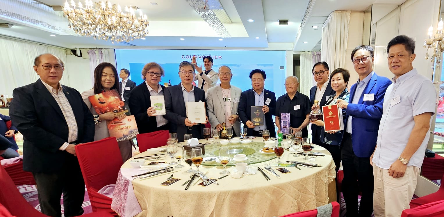 郭德亮一行出席商評(píng)中心拍賣晚宴