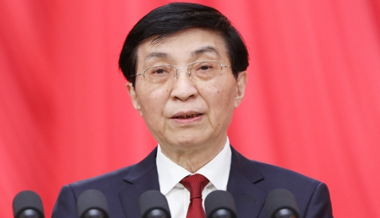 王滬寧代表政協(xié)第十四屆全國委員會常務委員會作工作報告