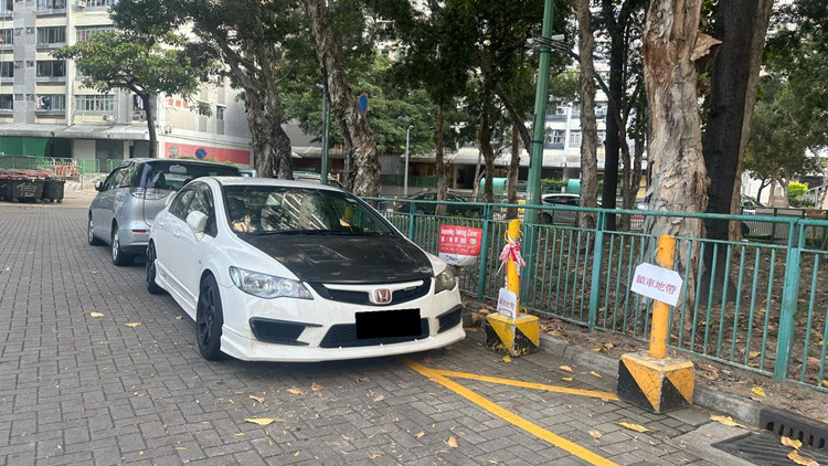 申訴專員主動調(diào)查公屋違例泊車  房署接納12項改善建議